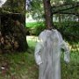 Leslie Wilcox. "Nightshirts: Adolescent," 4 x 3 x 3 feet, stainless steel screen, staples, 2003. [OUTSIDE]